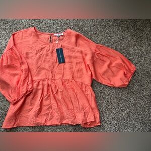 Michelle McDowell Coral Peplum Top